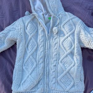 Fleece lined, hand-knit , wool , zip up , hooded sweater. NWT